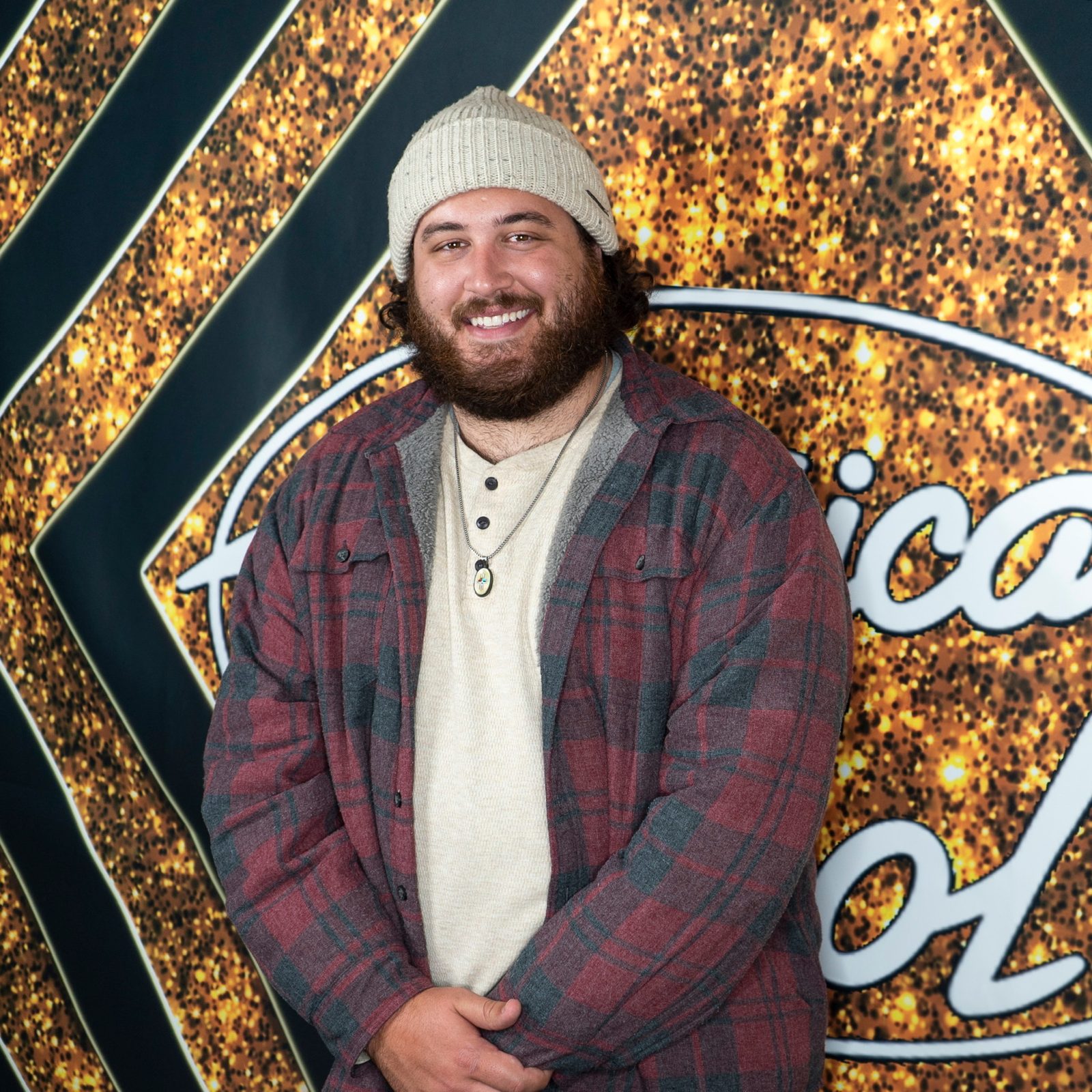 Graham DeFranco standing in front of a gold backdrop — Instagram post by @grahamdefranco